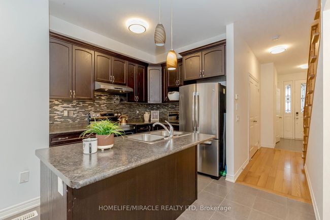 9 Dufay Rd, House attached with 4 bedrooms, 4 bathrooms and 3 parking in Brampton ON | Image 5