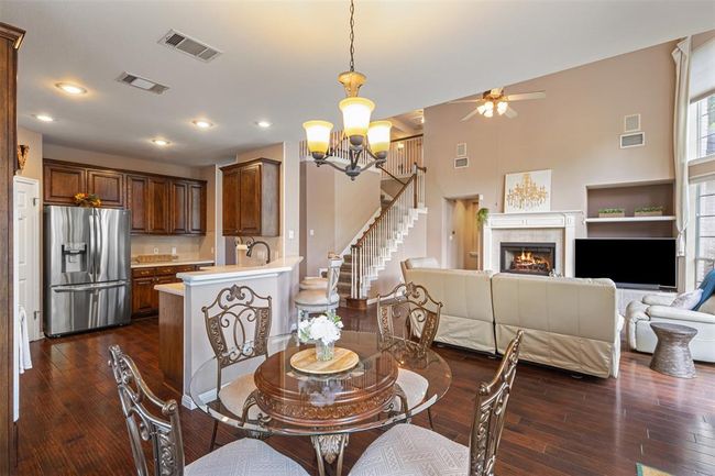 View into the living room from the breakfast area. | Image 9