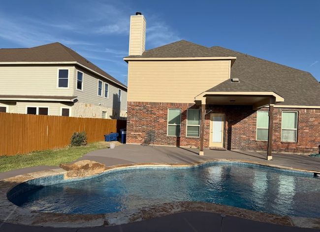 View of swimming pool with great space all year around to enjoy. | Image 33