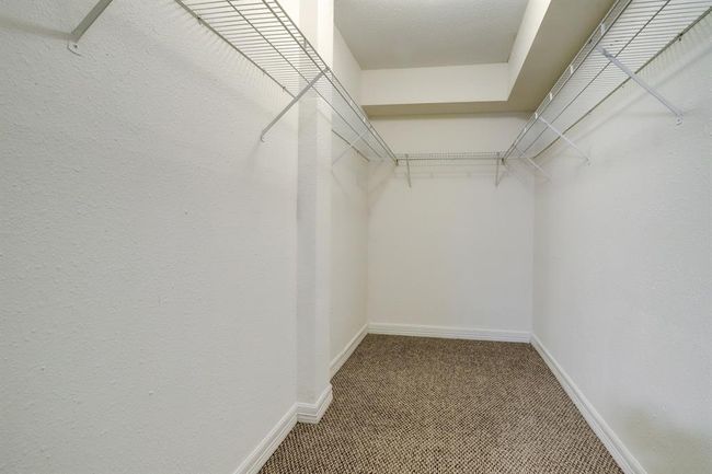 Each bedroom enjoys an enormous walk-in closet! | Image 6