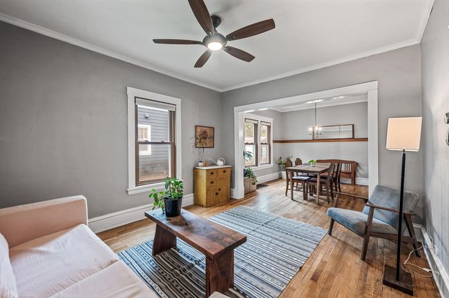 Spacious living room, enjoy the wood floors throughout the home | Image 5