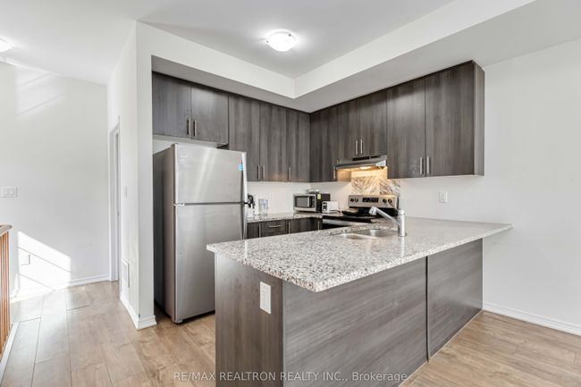 100 - 2674 Magdalen Path, Condo with 4 bedrooms, 3 bathrooms and 1 parking in Oshawa ON | Image 7