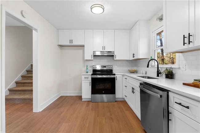 7000 Woodland Pl Nw, House other with 3 bedrooms, 2 bathrooms and null parking in Kennesaw GA | Image 7