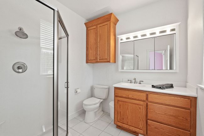Ensuite to main level guest bedroom | Image 25