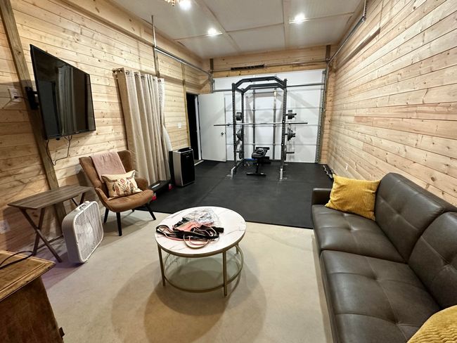 Living area and workout room and in hilltop barn. | Image 39