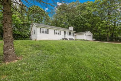 View of front of property with a front lawn and a garage | Image 3