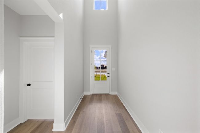 Doorway to outside featuring light hardwood / wood-style flooring | Image 5