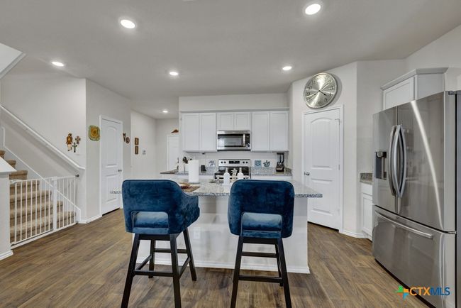 Additional seating offered at the island. | Image 4
