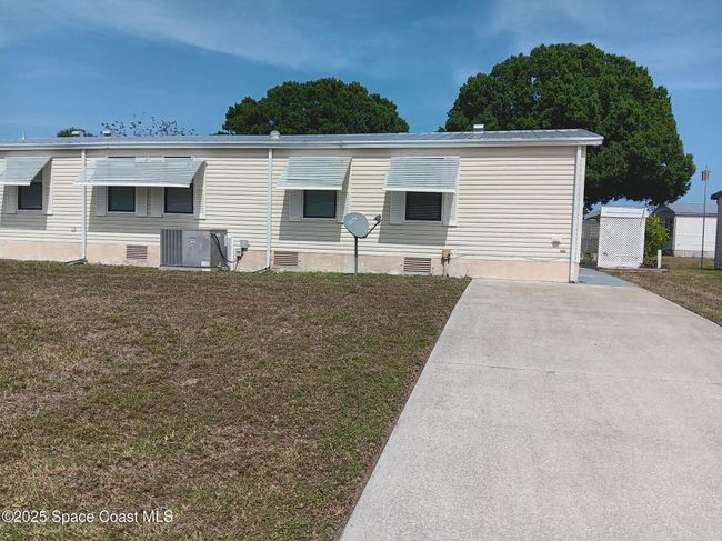 499 Marlin Cir, House other with 2 bedrooms, 2 bathrooms and null parking in Barefoot Bay FL | Image 22