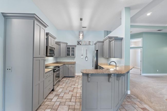7008 Turnberry Cir, House other with 4 bedrooms, 2 bathrooms and 3 parking in Navarre FL | Image 27