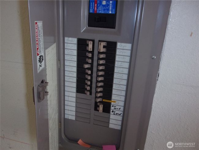 Electrical panel with room for additional breakers. | Image 31