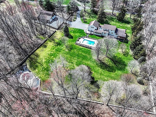 Custom Stone Walls Border the Property | Image 4