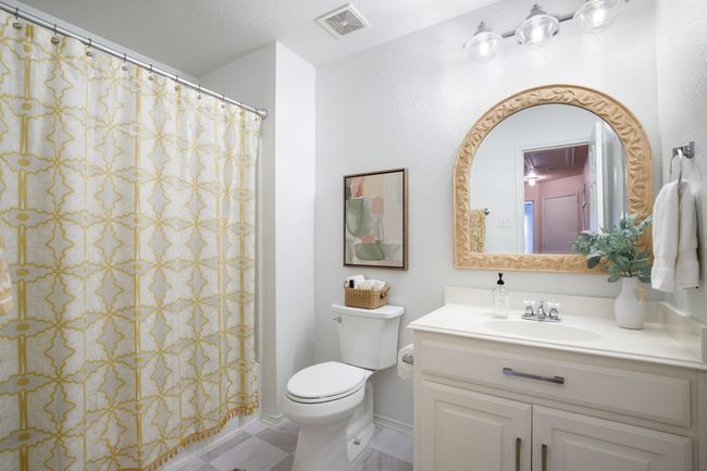 Bathroom featuring vanity and a shower with shower curtain | Image 22