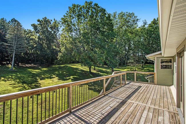 Deck off Bonus room is also a seperate rear entrance to home. | Image 23