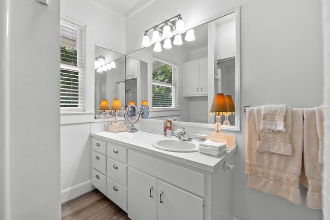 Bathroom featuring vanity, plenty of natural light, and wood finished floors | Image 15