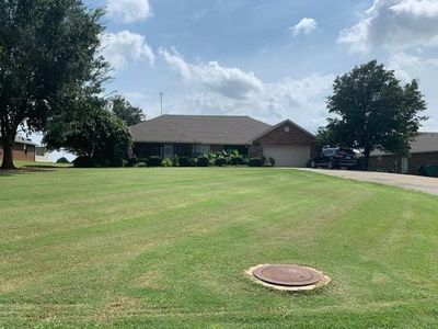 Ranch-style house featuring a front yard | Image 3