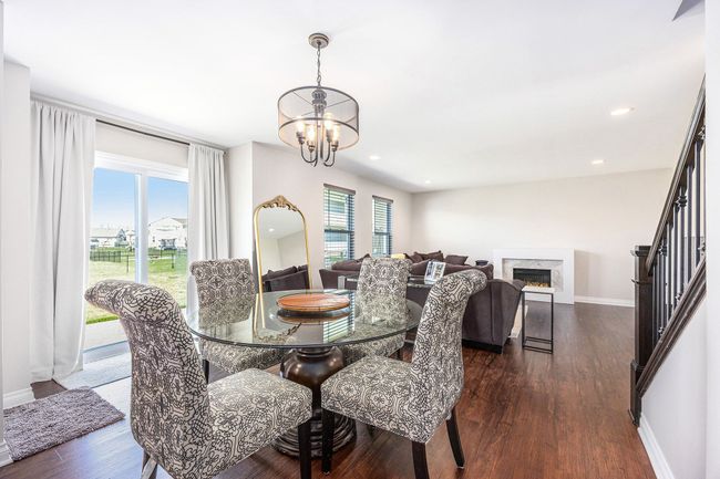 dining room with doorwall to patio | Image 7