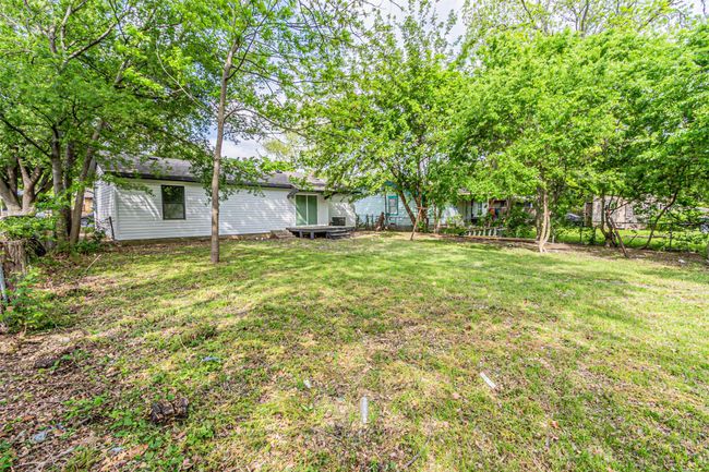 View of yard featuring a fenced backyard | Image 28