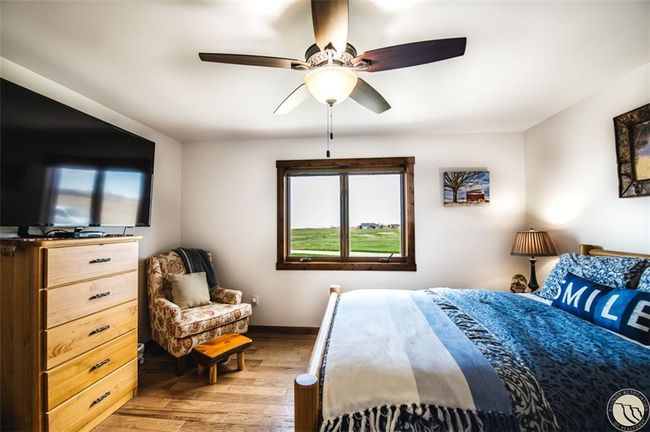 Bedroom 2 is spacious with a large closet | Image 19