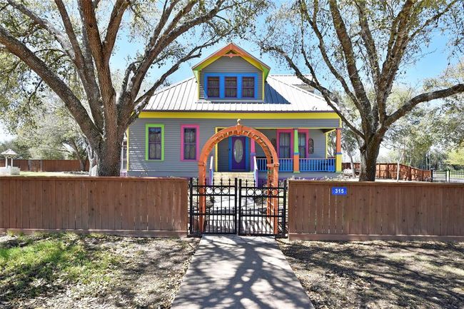 This is a magical place. Welcome to 315 Cedar in the sweet little town of New Ulm. Come on in the gate and see this amazing property. | Image 5