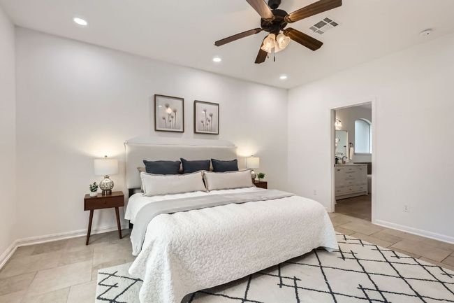 Bedroom featuring recessed lighting, baseboards, connected bathroom, and ceiling fan | Image 11