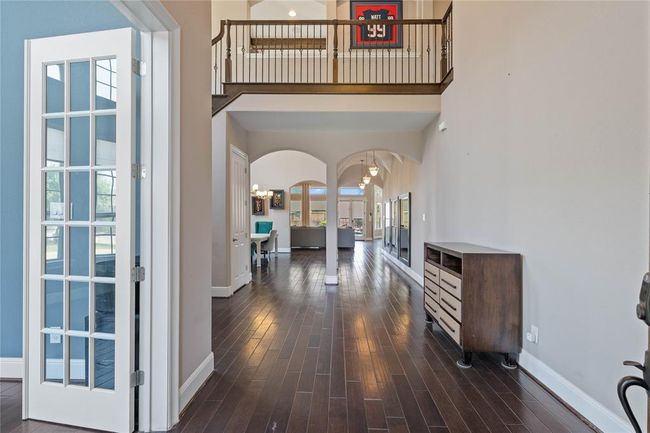 Sudy as you enter the home to the left. Secondary suite to the right. | Image 6