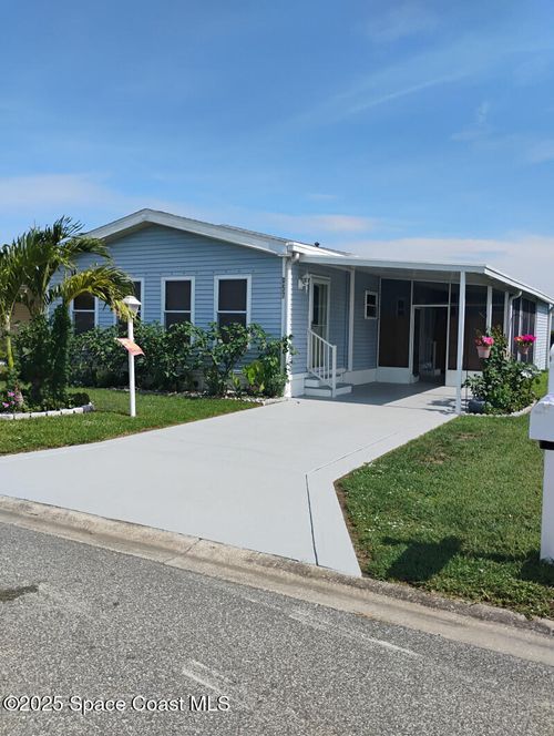 957 Cashew Cir, Barefoot Bay, FL, 32976-7502 | Card Image