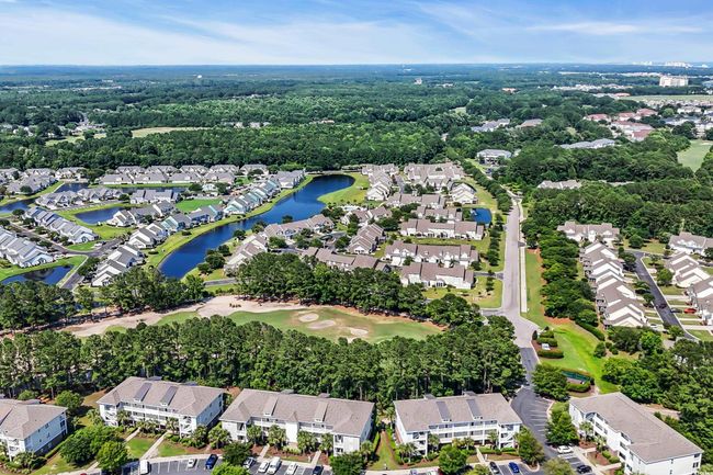 Aerial view of property and surrounding area featuring nearby suburban area | Image 34
