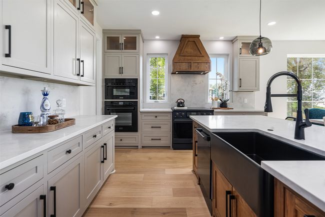 Beautiful black farm sink and black stainless steel appliances | Image 9