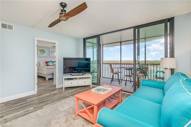 LIVING AREA VIEW SHOWING ENTRANCE TO OWNER'S SUITE | Image 4