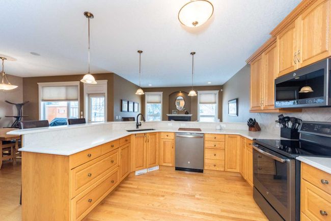 1212 Woodside Way Nw, Home with 4 bedrooms, 2 bathrooms and 4 parking in Airdrie AB | Image 8