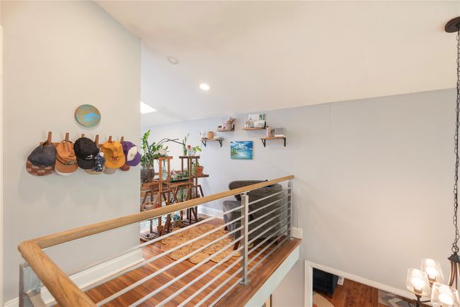 Additional space overlooking foyer, family room area | Image 40