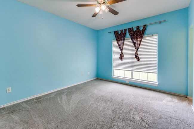 Unfurnished room featuring a ceiling fan, baseboards, and carpet floors | Image 29