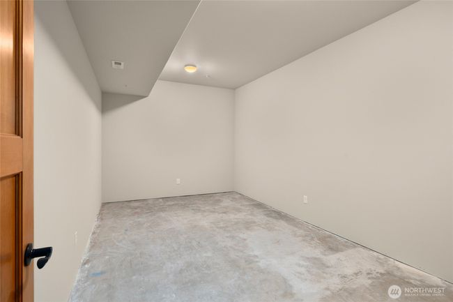 Unfinished room that leaves your imagination to run wild. Make this room into a wine room or a small theater room. Check out the next few virtually stage photos for this room. | Image 31