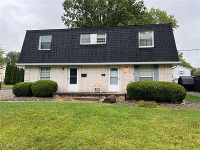 View of front of house featuring a front lawn | Image 1