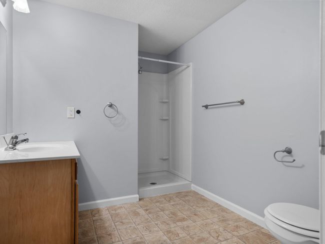 UNIT-104 - 301 N Lake St, Condo with 2 bedrooms, 2 bathrooms and null parking in Cadillac MI | Image 13