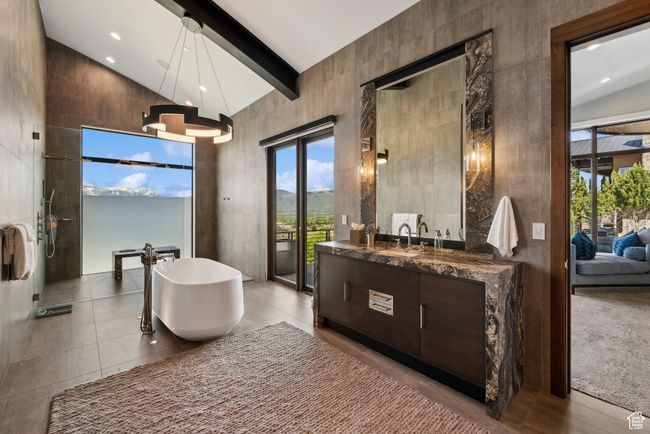 Full bath with high vaulted ceiling, a freestanding tub, vanity, ensuite bath, and beamed ceiling | Image 31