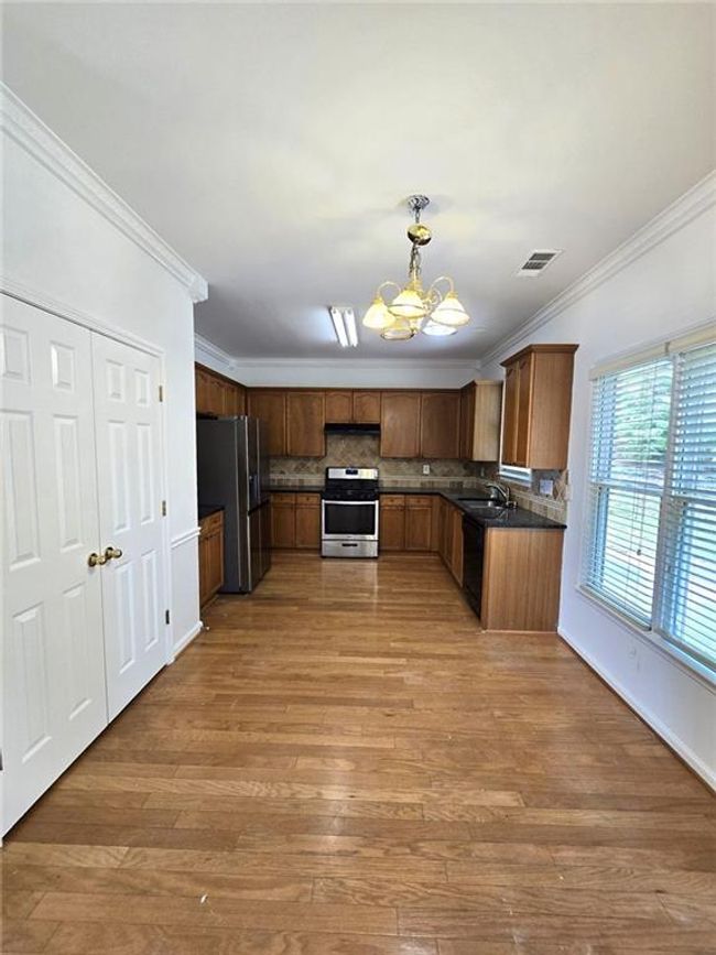 3070 Ridge Oak Dr, House other with 4 bedrooms, 3 bathrooms and 2 parking in Suwanee GA | Image 6