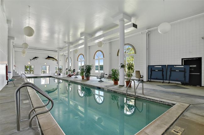 View of indoor community pool | Image 19