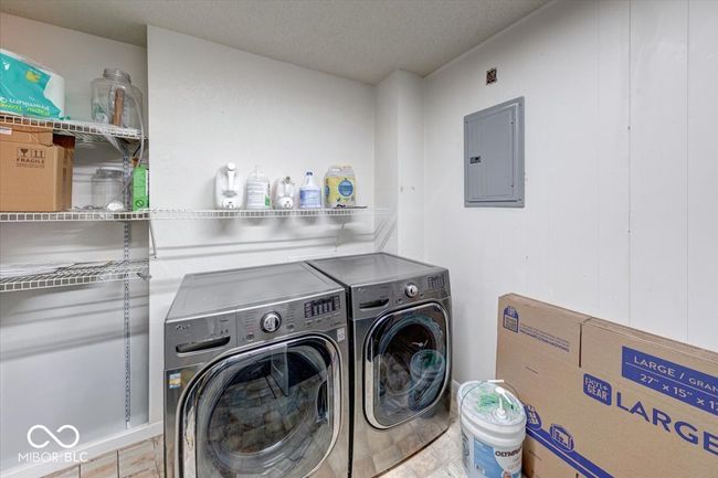 laundry room is on main level, washer and dryer stays | Image 47