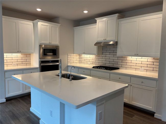 Kitchen featuring stainless steel appliances, under cabinet lighting | Image 6