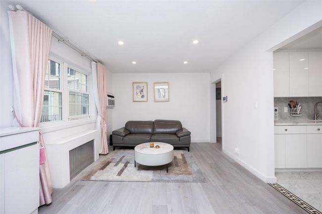 Living area featuring recessed lighting, light wood-style flooring, and baseboards | Image 4