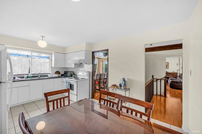 Dining room featuring light tile patterned flooring | Image 12