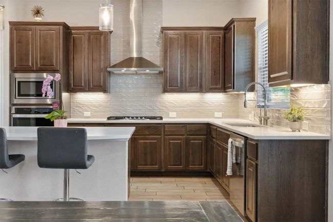 From the deep cabinetry to the central island, this kitchen is as practical as it is beautiful | Image 13