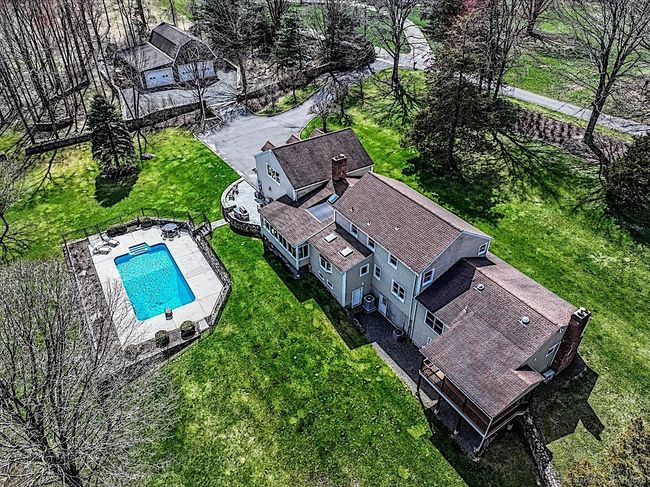 Bluestone Patio with Built-in Grill Overlooks Pool | Image 5