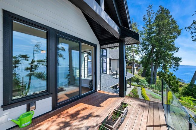 Wooden deck featuring a water view | Image 76