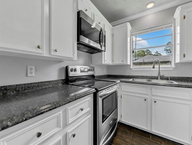27015 Coach Light Ln, House other with 3 bedrooms, 2 bathrooms and null parking in New Caney TX | Image 12
