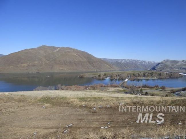 Mountain view with a large body of water | Image 41