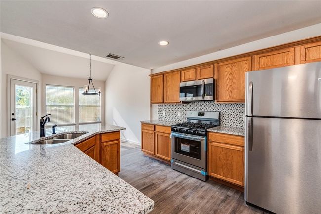 150 Bailey Loop, House other with 4 bedrooms, 3 bathrooms and 4 parking in Kyle TX | Image 8