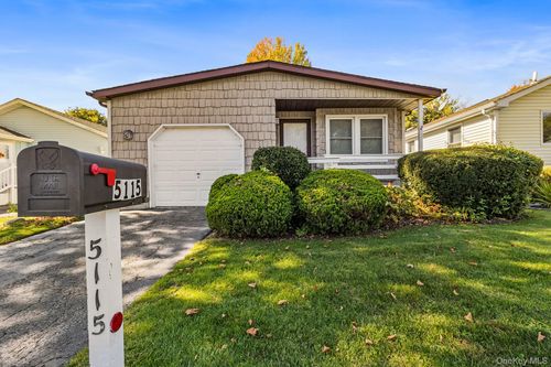 5115 Village Cir E, Manorville, NY, 11949-9565 | Card Image